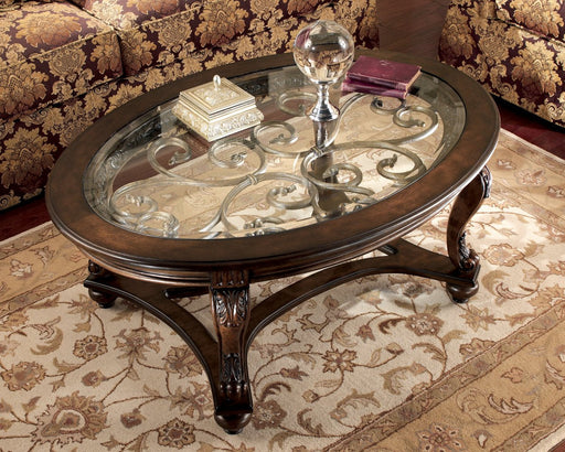 Norcastle Coffee Table - Premium Cocktail Table from Ashley Furniture - Just $378.01! Shop now at Furniture Wholesale Plus  We are the best furniture store in Nashville, Hendersonville, Goodlettsville, Madison, Antioch, Mount Juliet, Lebanon, Gallatin, Springfield, Murfreesboro, Franklin, Brentwood