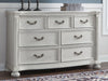 Montelaine - Dresser - Antique White – Dressers by Benchcraft® at Furniture Wholesale Plus , Nashville furniture store
