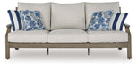 Rainier Ranch - Brown / Beige - Sofa With Cushion - Premium Sofas from Signature Design by Ashley® - Just $1548! Shop now at Furniture Wholesale Plus  We are the best furniture store in Nashville, Hendersonville, Goodlettsville, Madison, Antioch, Mount Juliet, Lebanon, Gallatin, Springfield, Murfreesboro, Franklin, Brentwood