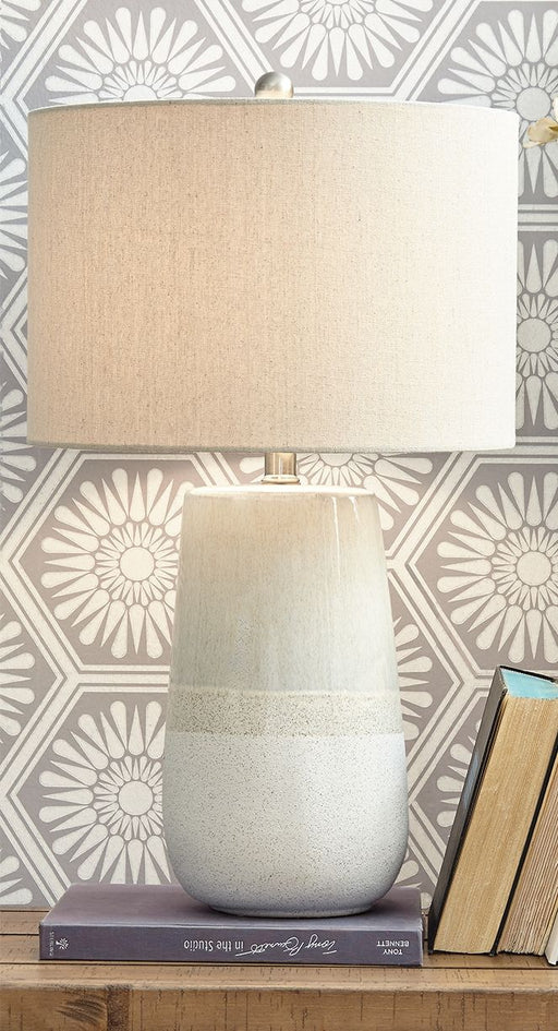 Shavon - Beige / White - Ceramic Table Lamp - Premium Table Lamps from Signature Design by Ashley® - Just $118! Shop now at Furniture Wholesale Plus  We are the best furniture store in Nashville, Hendersonville, Goodlettsville, Madison, Antioch, Mount Juliet, Lebanon, Gallatin, Springfield, Murfreesboro, Franklin, Brentwood