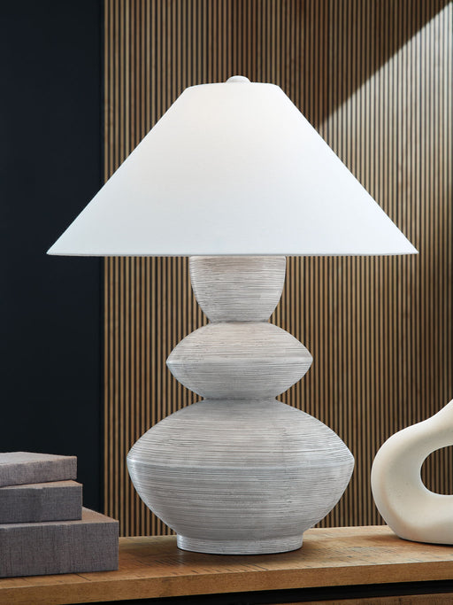 Brickdon - Distressed White - Poly Table Lamp - Premium Table Lamps from Signature Design by Ashley® - Just $158! Shop now at Furniture Wholesale Plus  We are the best furniture store in Nashville, Hendersonville, Goodlettsville, Madison, Antioch, Mount Juliet, Lebanon, Gallatin, Springfield, Murfreesboro, Franklin, Brentwood