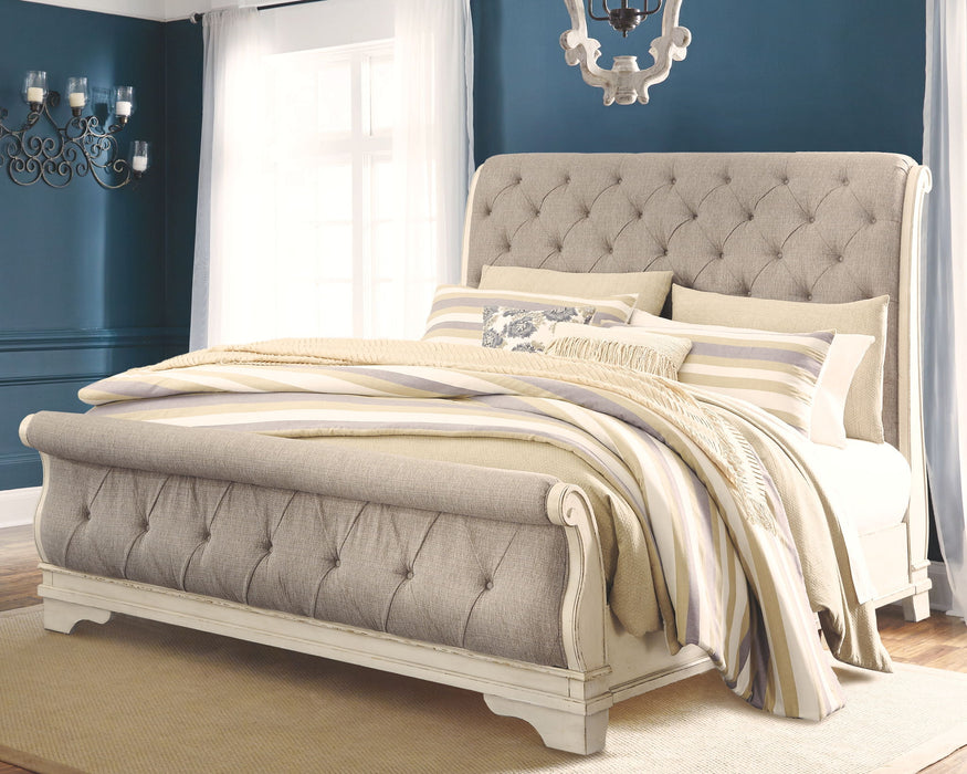 Realyn - Upholstered Sleigh Bed – Upholstered Beds by Signature Design by Ashley® at Furniture Wholesale Plus , Nashville furniture store
