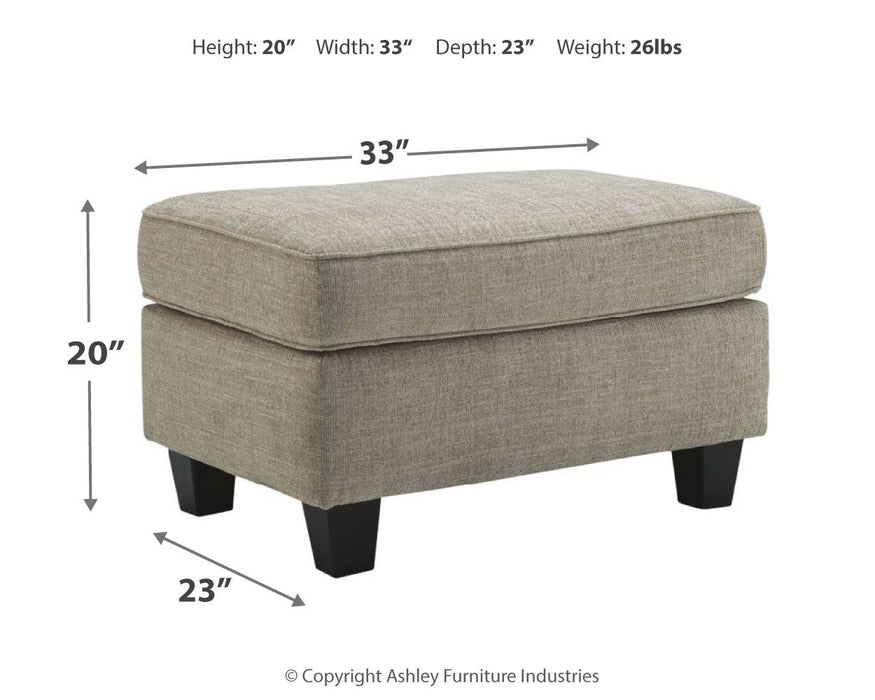 Kestrel - Ottoman - Driftwood – Upholstered Ottomans by Ashley® at Furniture Wholesale Plus , Nashville furniture store