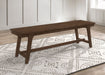 Reynolds Rectangular Trestle Base Dining Bench Brown Oak - Premium Bench from Coaster Z2 Standard - Just $200! Shop now at Furniture Wholesale Plus  We are the best furniture store in Nashville, Hendersonville, Goodlettsville, Madison, Antioch, Mount Juliet, Lebanon, Gallatin, Springfield, Murfreesboro, Franklin, Brentwood