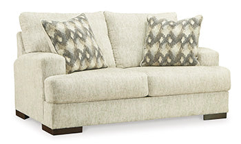 Caretti Loveseat - Premium Loveseat from Ashley Furniture - Just $642.90! Shop now at Furniture Wholesale Plus  We are the best furniture store in Nashville, Hendersonville, Goodlettsville, Madison, Antioch, Mount Juliet, Lebanon, Gallatin, Springfield, Murfreesboro, Franklin, Brentwood