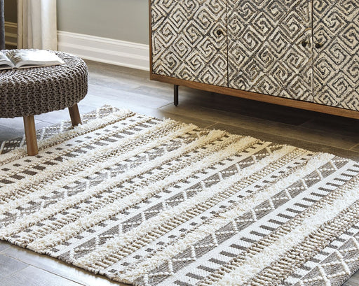 Karalee - Rug - Premium Area Rugs from Signature Design by Ashley® - Just $278! Shop now at Furniture Wholesale Plus  We are the best furniture store in Nashville, Hendersonville, Goodlettsville, Madison, Antioch, Mount Juliet, Lebanon, Gallatin, Springfield, Murfreesboro, Franklin, Brentwood