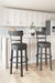 Valebeck - Tall Upholstered Swivel Barstool – Bar Height (28"-30") by Signature Design by Ashley® at Furniture Wholesale Plus , Nashville furniture store