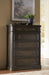 Wickenger - Five Drawer Chest - Dark Brown – Accent Chests by Signature Design by Ashley® at Furniture Wholesale Plus , Nashville furniture store