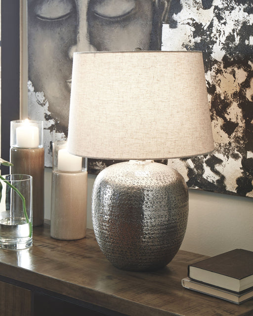 Magalie - Antique Silver Finish - Metal Table Lamp - Premium Table Lamps from Signature Design by Ashley® - Just $138! Shop now at Furniture Wholesale Plus  We are the best furniture store in Nashville, Hendersonville, Goodlettsville, Madison, Antioch, Mount Juliet, Lebanon, Gallatin, Springfield, Murfreesboro, Franklin, Brentwood