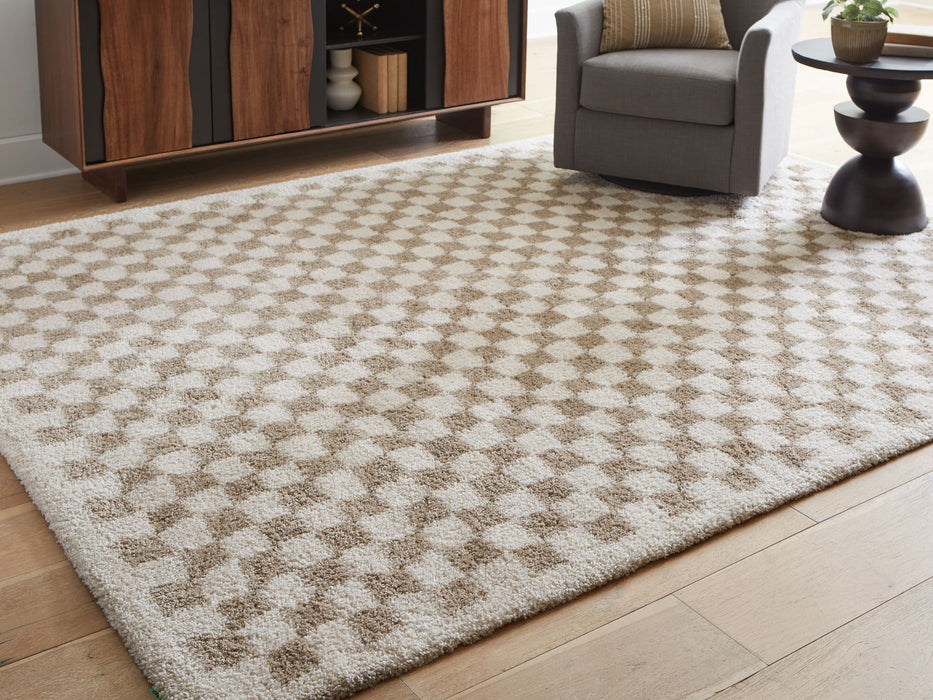 Karamen - Rug - Premium Area Rugs from Signature Design by Ashley® - Just $118! Shop now at Furniture Wholesale Plus  We are the best furniture store in Nashville, Hendersonville, Goodlettsville, Madison, Antioch, Mount Juliet, Lebanon, Gallatin, Springfield, Murfreesboro, Franklin, Brentwood