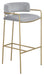 Comstock Upholstered Low Back Stool Grey and Gold - Premium Barstool from Coaster Z2 Standard - Just $170! Shop now at Furniture Wholesale Plus  We are the best furniture store in Nashville, Hendersonville, Goodlettsville, Madison, Antioch, Mount Juliet, Lebanon, Gallatin, Springfield, Murfreesboro, Franklin, Brentwood