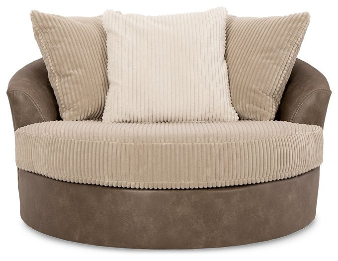 Keskin Oversized Swivel Accent Chair - Premium Chair from Ashley Furniture - Just $796.34! Shop now at Furniture Wholesale Plus  We are the best furniture store in Nashville, Hendersonville, Goodlettsville, Madison, Antioch, Mount Juliet, Lebanon, Gallatin, Springfield, Murfreesboro, Franklin, Brentwood