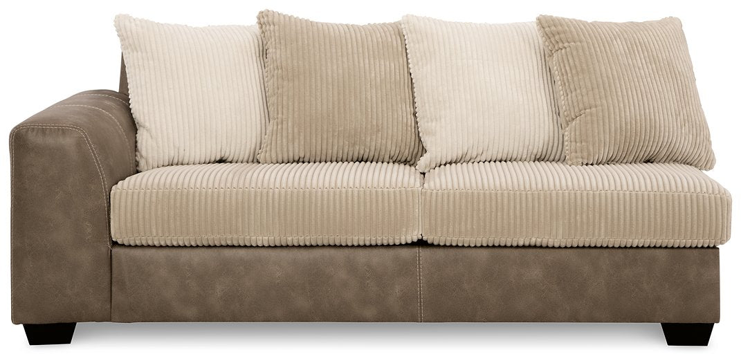 Keskin 2-Piece Sectional with Chaise - Premium Sectional from Ashley Furniture - Just $1262.99! Shop now at Furniture Wholesale Plus  We are the best furniture store in Nashville, Hendersonville, Goodlettsville, Madison, Antioch, Mount Juliet, Lebanon, Gallatin, Springfield, Murfreesboro, Franklin, Brentwood