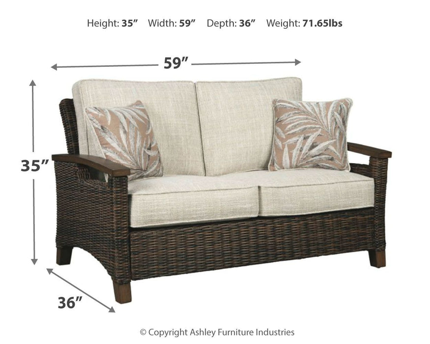 Paradise Trail - Medium Brown - Loveseat w/Cushion - Premium Loveseats from Signature Design by Ashley® - Just $1138! Shop now at Furniture Wholesale Plus  We are the best furniture store in Nashville, Hendersonville, Goodlettsville, Madison, Antioch, Mount Juliet, Lebanon, Gallatin, Springfield, Murfreesboro, Franklin, Brentwood