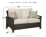 Paradise Trail - Medium Brown - Loveseat w/Cushion - Premium Loveseats from Signature Design by Ashley® - Just $1138! Shop now at Furniture Wholesale Plus  We are the best furniture store in Nashville, Hendersonville, Goodlettsville, Madison, Antioch, Mount Juliet, Lebanon, Gallatin, Springfield, Murfreesboro, Franklin, Brentwood