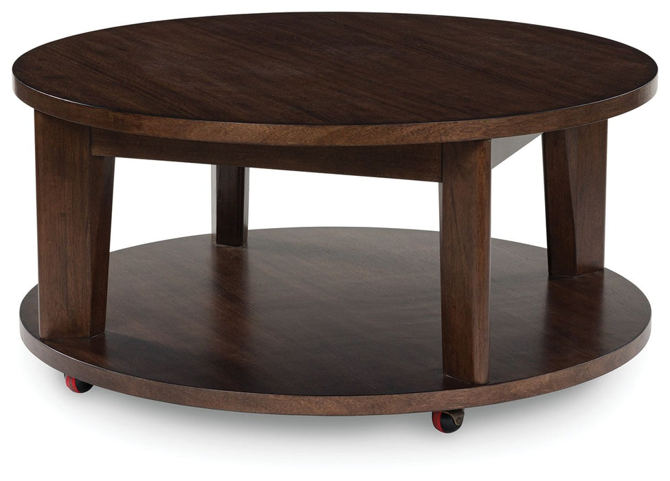Korestone 2 - Round Cocktail Table - Dark Brown – Coffee Tables by Signature Design by Ashley® at Furniture Wholesale Plus , Nashville furniture store