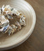 Justy - Bowl - Antique Beige – Plates & Bowls by Signature Design by Ashley® at Furniture Wholesale Plus , Nashville furniture store