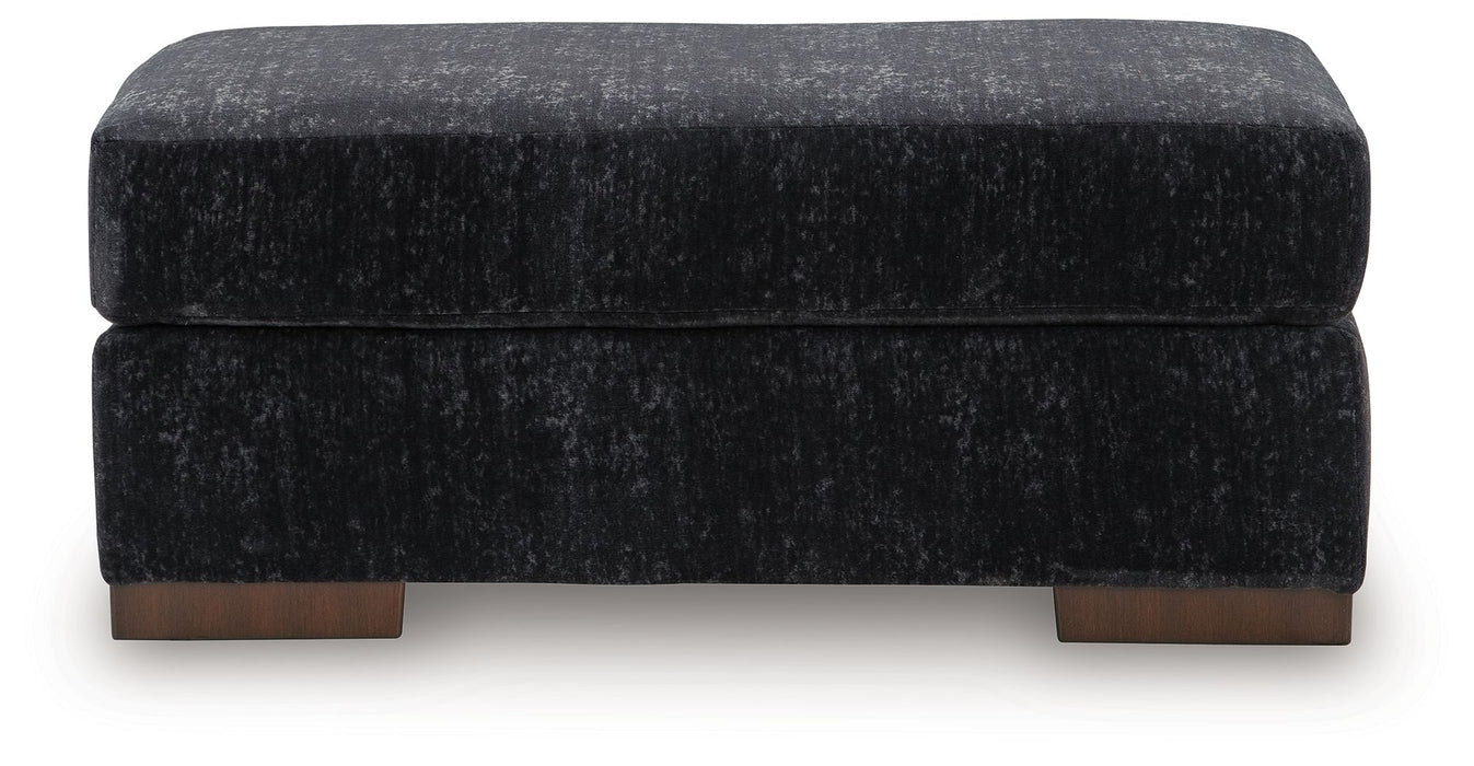 Whitmore Manor - Ottoman - Black Pearl – Upholstered Ottomans by Benchcraft® at Furniture Wholesale Plus , Nashville furniture store