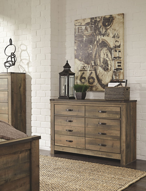 Trinell - Six Drawer Dresser - 61.34" x 15.98" x 42.99" - Brown Dark – Dressers by Signature Design by Ashley® at Furniture Wholesale Plus , Nashville furniture store