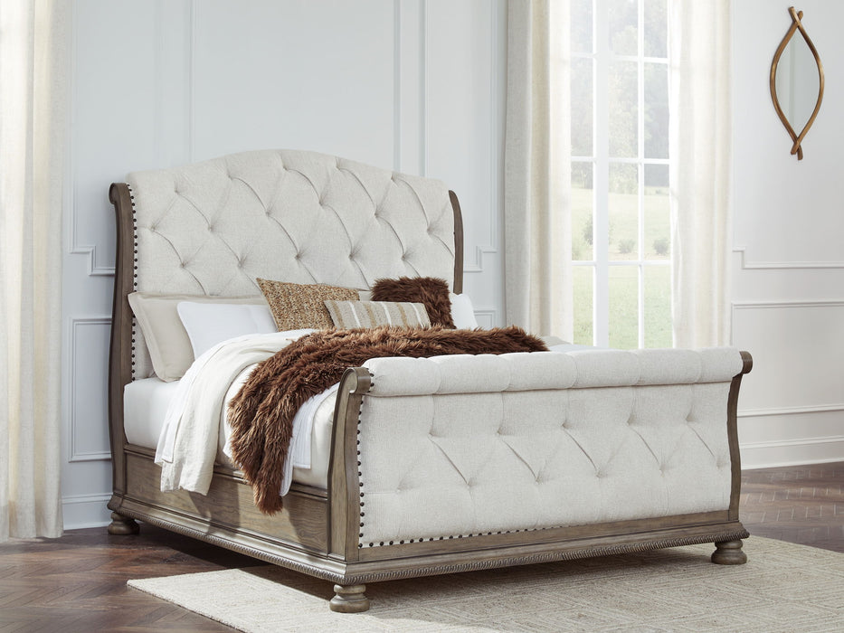 Ardenfield - Upholstered Sleigh Bed – Sleigh Beds by Signature Design by Ashley® at Furniture Wholesale Plus , Nashville furniture store