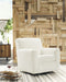 Herstow - Swivel Glider Accent Chair - Premium Swivel Glider Chairs from Signature Design by Ashley® - Just $468! Shop now at Furniture Wholesale Plus  We are the best furniture store in Nashville, Hendersonville, Goodlettsville, Madison, Antioch, Mount Juliet, Lebanon, Gallatin, Springfield, Murfreesboro, Franklin, Brentwood