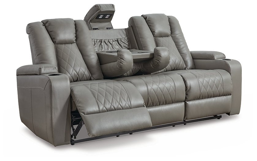 Mancin Reclining Sofa with Drop Down Table - Premium Sofa from Ashley Furniture - Just $832.92! Shop now at Furniture Wholesale Plus  We are the best furniture store in Nashville, Hendersonville, Goodlettsville, Madison, Antioch, Mount Juliet, Lebanon, Gallatin, Springfield, Murfreesboro, Franklin, Brentwood