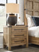 Ridgester - Three Drawer Night Stand - Light Brown – Nightstands w/ Charging Stations by Benchcraft® at Furniture Wholesale Plus , Nashville furniture store