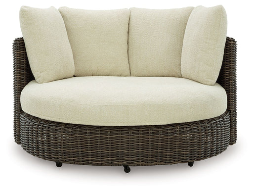Kimora - Beige / Dark Brown - Swivel Lounge Chair With Cushion - Premium Swivel Chairs from Signature Design by Ashley® - Just $1528! Shop now at Furniture Wholesale Plus  We are the best furniture store in Nashville, Hendersonville, Goodlettsville, Madison, Antioch, Mount Juliet, Lebanon, Gallatin, Springfield, Murfreesboro, Franklin, Brentwood