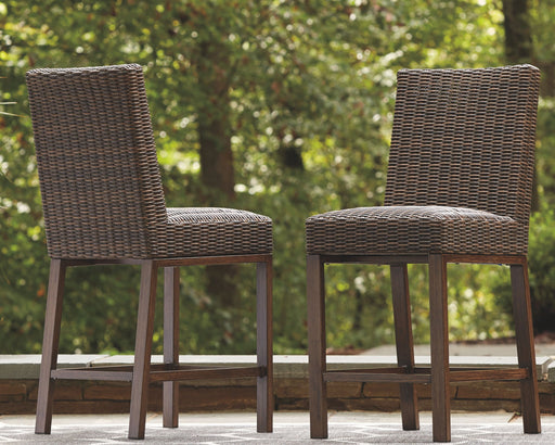Paradise Trail - Medium Brown - Barstool (Set of 2) - Premium Stool Sets from Signature Design by Ashley® - Just $618! Shop now at Furniture Wholesale Plus  We are the best furniture store in Nashville, Hendersonville, Goodlettsville, Madison, Antioch, Mount Juliet, Lebanon, Gallatin, Springfield, Murfreesboro, Franklin, Brentwood