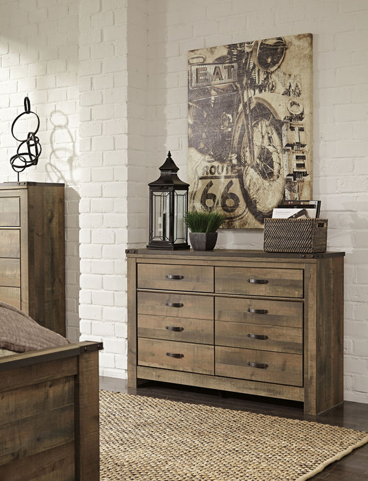 Trinell - Six Drawer Dresser - 61.34" x 15.98" x 42.99" - Brown Dark – Dressers by Signature Design by Ashley® at Furniture Wholesale Plus , Nashville furniture store