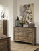 Trinell - Six Drawer Dresser - 61.34" x 15.98" x 42.99" - Brown Dark – Dressers by Signature Design by Ashley® at Furniture Wholesale Plus , Nashville furniture store