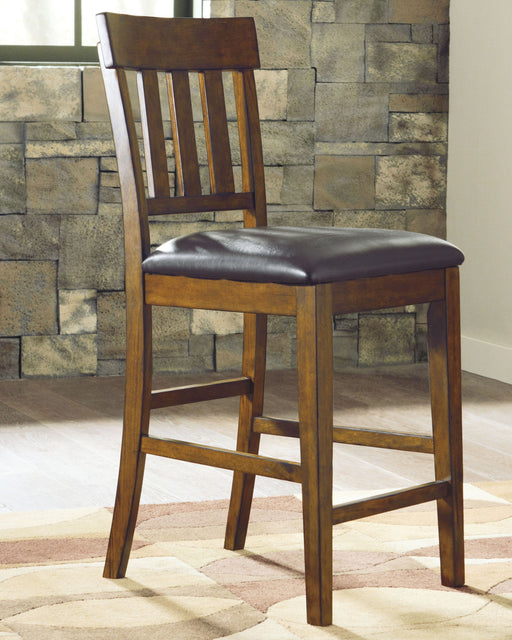 Ralene - Medium Brown - Upholstered Barstool (Set of 2) - Premium Stool Sets from Signature Design by Ashley® - Just $238! Shop now at Furniture Wholesale Plus  We are the best furniture store in Nashville, Hendersonville, Goodlettsville, Madison, Antioch, Mount Juliet, Lebanon, Gallatin, Springfield, Murfreesboro, Franklin, Brentwood