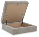Aslan Court - Ottoman With Storage - Pebble – Storage Ottomans by Benchcraft® at Furniture Wholesale Plus , Nashville furniture store