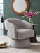 Nashkins - Swivel Accent Chair - Pebble – Swivel Chairs by Signature Design by Ashley® at Furniture Wholesale Plus , Nashville furniture store