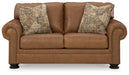 Carianna - Loveseat - Caramel – Stationary Loveseats by Signature Design by Ashley® at Furniture Wholesale Plus , Nashville furniture store