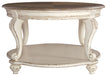 Realyn - Oval Cocktail Table - White / Brown – Cocktail Tables by Signature Design by Ashley® at Furniture Wholesale Plus , Nashville furniture store