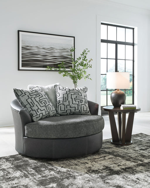 Brixley Pier - Graphite - Oversized Swivel Accent Chair - Premium Swivel Chairs from Benchcraft® - Just $668! Shop now at Furniture Wholesale Plus  We are the best furniture store in Nashville, Hendersonville, Goodlettsville, Madison, Antioch, Mount Juliet, Lebanon, Gallatin, Springfield, Murfreesboro, Franklin, Brentwood