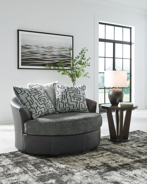 Brixley Pier - Graphite - Oversized Swivel Accent Chair - Premium Swivel Chairs from Benchcraft® - Just $668! Shop now at Furniture Wholesale Plus  We are the best furniture store in Nashville, Hendersonville, Goodlettsville, Madison, Antioch, Mount Juliet, Lebanon, Gallatin, Springfield, Murfreesboro, Franklin, Brentwood