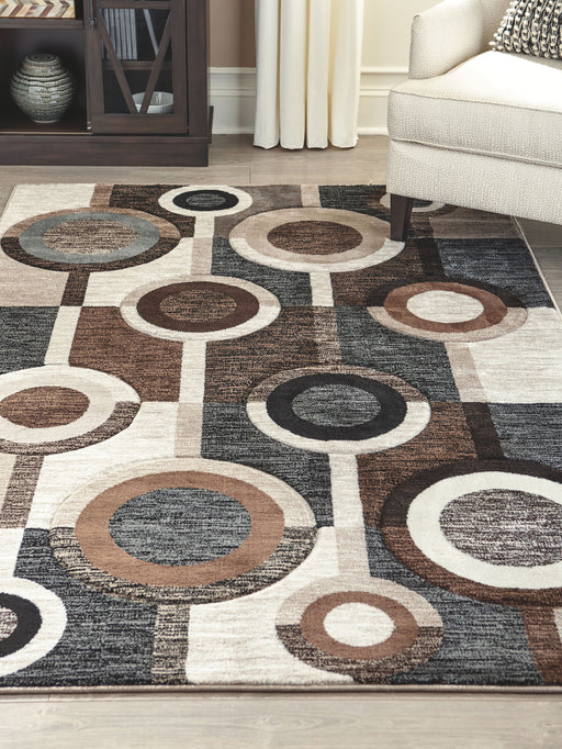 Guintte - Rug - Premium Area Rugs from Signature Design by Ashley® - Just $158! Shop now at Furniture Wholesale Plus  We are the best furniture store in Nashville, Hendersonville, Goodlettsville, Madison, Antioch, Mount Juliet, Lebanon, Gallatin, Springfield, Murfreesboro, Franklin, Brentwood