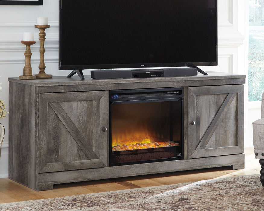 Wynnlow - 63" TV Stand With Glass/Stone Fireplace Insert - Gray – Fireplace TV Stands by Signature Design by Ashley® at Furniture Wholesale Plus , Nashville furniture store