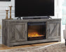 Wynnlow - 63" TV Stand With Glass/Stone Fireplace Insert - Gray – Fireplace TV Stands by Signature Design by Ashley® at Furniture Wholesale Plus , Nashville furniture store