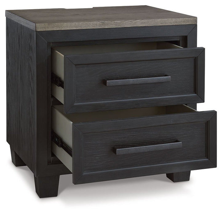 Foyland - Two Drawer Night Stand - Black / Brown – Nightstands w/ Charging Stations by Signature Design by Ashley® at Furniture Wholesale Plus , Nashville furniture store