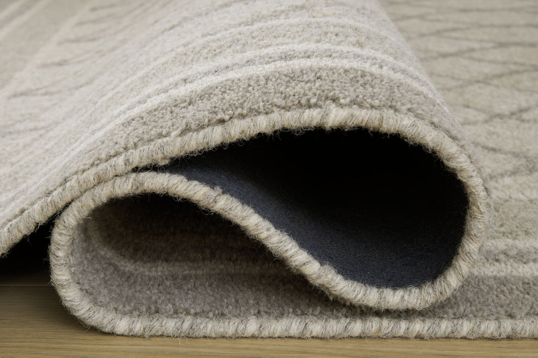 Wimney - Rug - Premium Area Rugs from Signature Design by Ashley® - Just $218! Shop now at Furniture Wholesale Plus  We are the best furniture store in Nashville, Hendersonville, Goodlettsville, Madison, Antioch, Mount Juliet, Lebanon, Gallatin, Springfield, Murfreesboro, Franklin, Brentwood