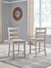 Skempton - Upholstered Barstool (Set of 2) - White – Stool Sets by Signature Design by Ashley® at Furniture Wholesale Plus , Nashville furniture store
