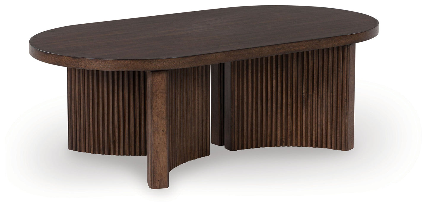 Korestone - Oval Cocktail Table - Dark Brown – Coffee Tables by Signature Design by Ashley® at Furniture Wholesale Plus , Nashville furniture store