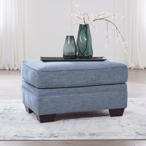 Carissa Manor - Denim - Ottoman - Premium Upholstered Ottomans from Benchcraft® - Just $238! Shop now at Furniture Wholesale Plus  We are the best furniture store in Nashville, Hendersonville, Goodlettsville, Madison, Antioch, Mount Juliet, Lebanon, Gallatin, Springfield, Murfreesboro, Franklin, Brentwood