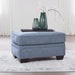 Carissa Manor - Ottoman - Denim – Upholstered Ottomans by Benchcraft® at Furniture Wholesale Plus , Nashville furniture store