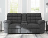 Wilhurst Reclining Loveseat with Console - Premium Loveseat from Ashley Furniture - Just $802.44! Shop now at Furniture Wholesale Plus  We are the best furniture store in Nashville, Hendersonville, Goodlettsville, Madison, Antioch, Mount Juliet, Lebanon, Gallatin, Springfield, Murfreesboro, Franklin, Brentwood