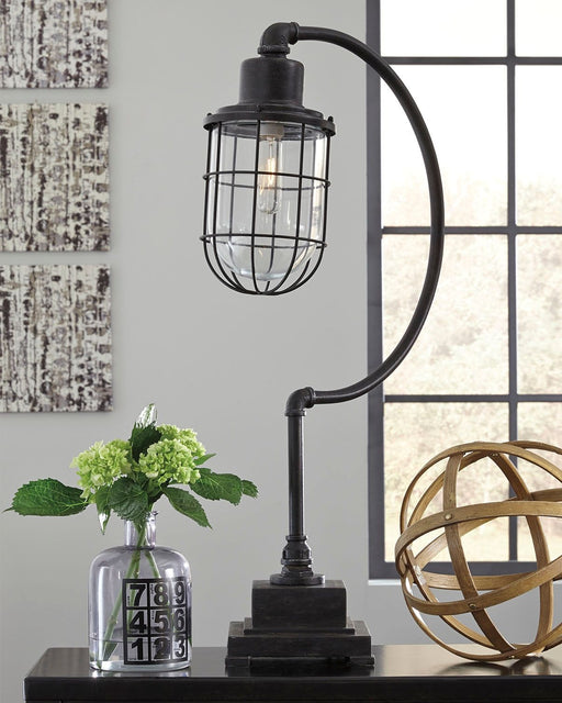 Jae - Antique Black - Metal Desk Lamp - Premium Table Lamps from Signature Design by Ashley® - Just $128! Shop now at Furniture Wholesale Plus  We are the best furniture store in Nashville, Hendersonville, Goodlettsville, Madison, Antioch, Mount Juliet, Lebanon, Gallatin, Springfield, Murfreesboro, Franklin, Brentwood