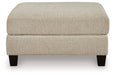 Steelwater Retreat - Oversized Accent Ottoman - Latte – Accent Ottomans by Benchcraft® at Furniture Wholesale Plus , Nashville furniture store